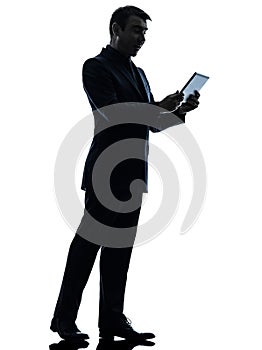 Business man surprised digital tablet silhouette