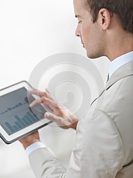 Business man, tablet screen and graphs, charts or data analysis for financial report, increase in revenue or profit