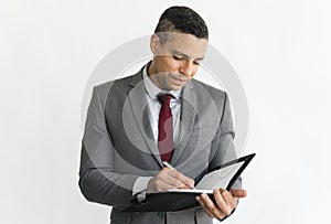 Business man taking notes isolated on white background