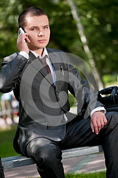 Business man talk by mobile phone. Student