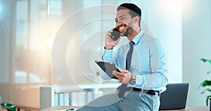 Business man talking on a phone while browsing on a digital tablet in an office. Dedicated sales executive and young