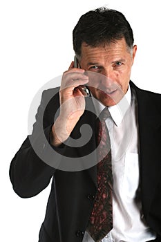 Business man talking on the phone negotiating some serious deals