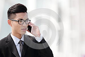 Business man talking on smart phone