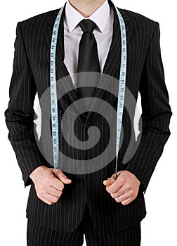 Business man with tape measure