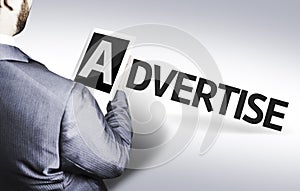 Business man with the text Advertise in a concept image photo