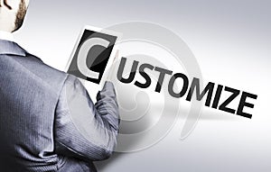 Business man with the text Customize in a concept image photo