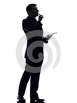 Business man thinking pensive digital tablet silhouette