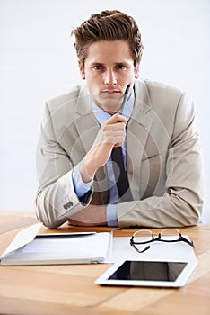 Business man, thinking and serious in portrait, professional and planning on tablet or paperwork. Male person