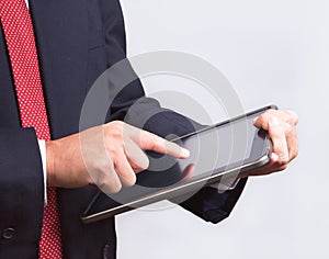 Business man touching tablet pc