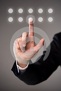 Business man touching virtual panel