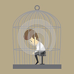 A Business man trapped in a cage, without freedom