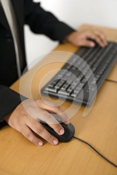 Business man typing with keyboar