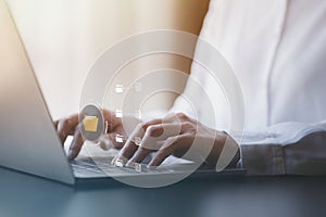 business man typing on a keyboard with holograms of digital document files, data files on computers stored as cloud databases can