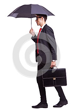 Business man with umbrella and briefcase