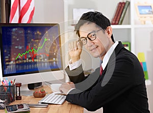 Business man use computer in office.Business man wearing glasses