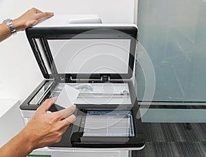 Business man use mock up key card for scanning document