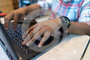 Business man using laptop computer, close up hand typing notebook keyboard..Freelance working on laptop write blog on web, surfing