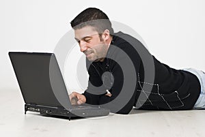 Business man using laptop home