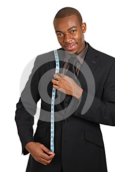 Business man using a measuring tape