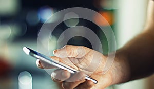 Business Man using Mobile Phone in Office