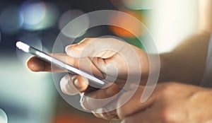 Business Man using Mobile Phone in Office