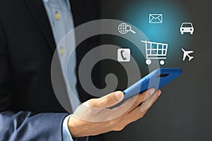 Business man using mobile smartphone with internet web icons, globalization online shopping, e business, internet of things ,