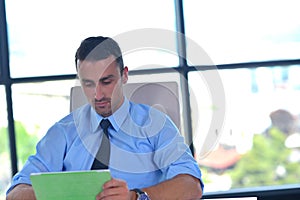 Business man using tablet compuer at office