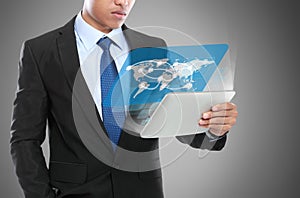 Business man using tablet PC. conceptual image