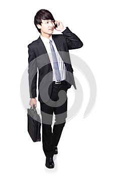 Business man Walking while talking phone