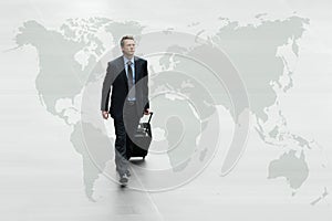 Business man walking the world map, international travel concept