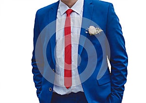 Business man in white shirt, blue suit and red tie on white background isolated