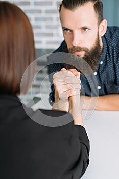 Business man woman arm wrestling office conflict