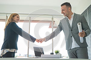 Business man and woman couple fist bump hand together f