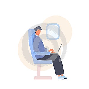Business man work at laptop sitting in airplane chair. Passenger tourist with computer. Travel by plane