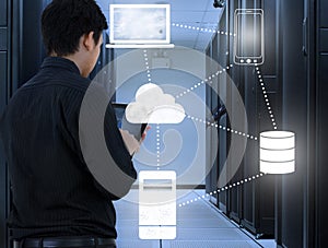 Business man working in data center with cloud technology