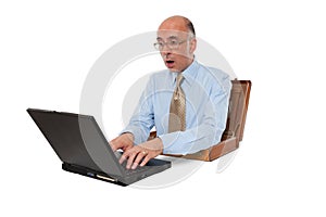 Business man working with his laptop at desk