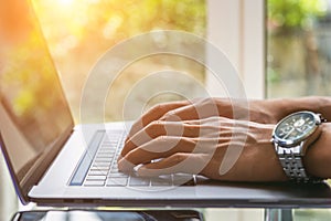 Business man working on laptop, Close up of hands of business man, Business concept