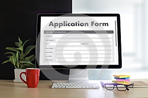 business man working on laptop computer use Online Web Job Application Form moniter photo