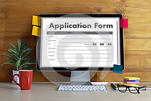 business man working on laptop computer use Online Web Job Application Form moniter photo