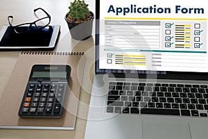 business man working on laptop computer use Online Web Job Application Form moniter photo