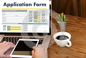 business man working on laptop computer use Online Web Job Application Form moniter photo