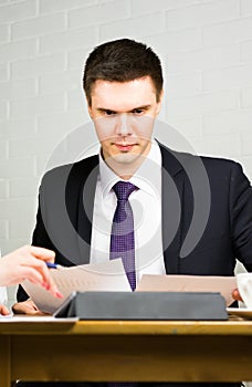 Business man working at office with documents on his desk, consultant lawyer concept