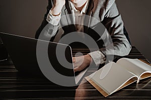 Business man working at office with laptop and documents on his desk, consultant lawyer concept