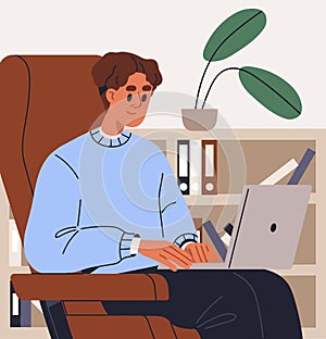 Business man working online at laptop computer, sitting in armchair. Businessman typing, surfing in internet with