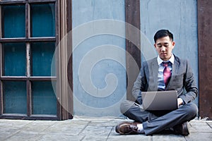 Business Man Working Outdoor - Work Anywhere Concept photo