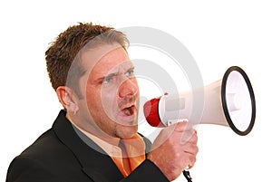 Business man yelling into a megaphone
