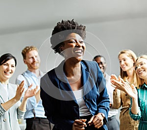 business meeting businesswoman woman success congratulating happy clapping applause teamwork greeting introduction