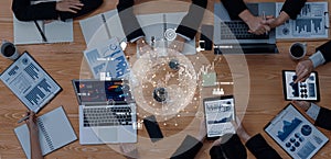 Business Meeting with Digital Data Visualization and Technology Devices on Wooden Table, Financial Reports and