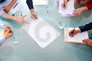 Business meeting teamwork aerial hands papers