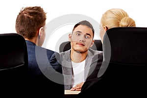 Business meeting-three people sitting and talking